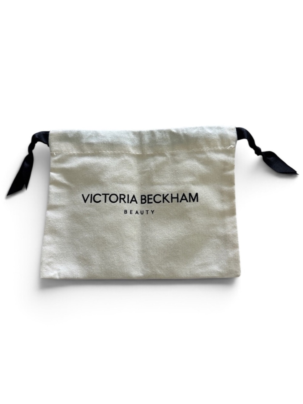 NWOT Victoria Beckham Beauty Ivory Drawstring Pouch with Black Ribbon Closure